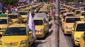 Taximetriştii eleni au anunţat o grevă de 24 de ore şi au blocat traficul 