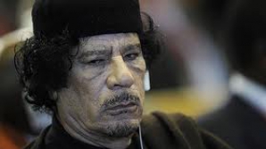 Muammar Gaddafi este dat în urmărire de Interpol