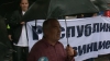 Protest: "Kirill, pleacă acasă!", au scandat câţiva tineri