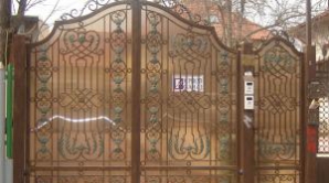Preţul pentru o poartă din fier forjat poate depăşi preţul unei case 
