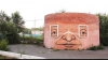 Artistul care face clădirile să zâmbească FOTO şi VIDEO  