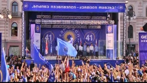 Zeci de mii de susţinători ai opoziţiei georgiene au ieşit să protesteze pe străzile oraşului Tibilisi