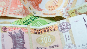CURS VALUTAR: Moneda naţională câştigă teren în faţa euro