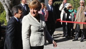 Cancelarul german, Angela Merkel, primită cu huiduieli şi proteste la Lisabona