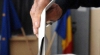 Românii îşi aleg noul Parlament în condiţii meteo extreme. Peste 20% din alegători au votat până la ora 14.00