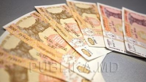 Leul îşi întăreşte poziţiile în raport cu principalele monede de referinţă