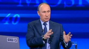 Vladimir Putin susţine că nu duce ţara înapoi spre stalinism şi este mulţumit de activitatea sa