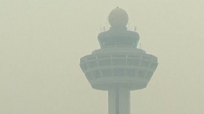 O perdea de fum ar putea acoperi oraşul Singapore mai multe săptămâni 