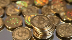 BITCOIN a atins un nou RECORD. Valoarea unei monede este de 8.200 de dolari 