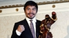 Şi-a dedicat victoria sinistraţilor. Manny Pacquiao a vizitat zonele afectate de taifunul Haiyan