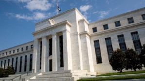 Rezerva Federală a SUA a anunţat că va reduce programul de achiziţie a obligaţiunilor 