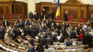 După o zi de negocieri, opoziţia de la Kiev a rămas nemulţumită de Legea amnistiei, adoptată de Rada Supremă