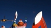 Flacăra olimpică a ajuns pe Muntele Elbrus, fiind transportată de doi alpinişti