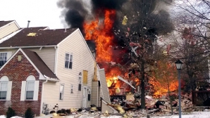 Explozie în SUA: Un om a murit, iar 10 case au fost aruncate în aer (VIDEO)