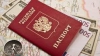 O femeie, reţinută în flagrant de CNA: A promis că poate face rost de cetăţenie rusă pentru 2.500 de euro