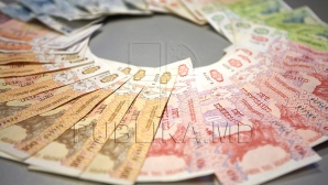 Făceau milioane de lei, dar nu le declarau la Fisc. Doi bărbaţi au fost reţinuţi în flagrant de poliţişti