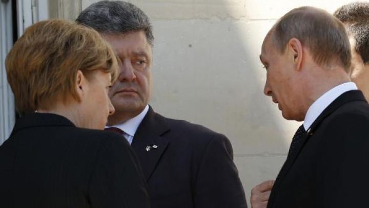 Vladimir Putin şi Petro Poroșenko, faţă în faţă! Cei doi lideri s-au întâlnit în Normandia