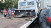 IMAGINI AMEŢITOARE. Un evacuator este lovit de un camion în Moscova şi provoacă haos în trafic (VIDEO)