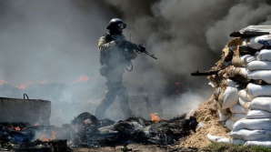 Un convoi cu refugiaţi din Lugansk a fost atacat de separatiştii proruşi