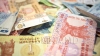 Cursul valutar: Leul continuă să piardă teren în raport cu moneda unică europeană