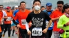 Maraton în condiţii extreme la Beijing: Majoritatea concurenţilor au alergat cu măşti pe faţă (VIDEO)