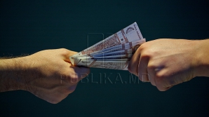 Un poliţist din Făleşti, reţinut de ofiţerii CNA. Ce a făcut omul legii şi cum ar putea fi pedepsit