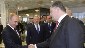 Putin şi Poroşenko, din nou la aceeaşi masă. Cei doi lideri au participat la un mic dejun de lucru