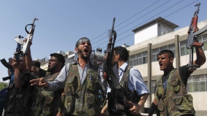 Jihadiştii ar putea comite un masacru de proporţii chiar sub nasul Turciei. Islamiştii se află la un kilometru de frontieră