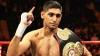 Amir Khan l-a învins pe Devon Alexander într-o luptă fără titlu pus în joc