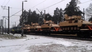 ÎNCEPE RĂZBOIUL? Tancuri americane au fost filmate în apropiere de graniţa cu Rusia