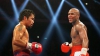 Pugiliştii Manny Pacquiao şi Floyd Mayweather au schimbat numere de telefoane la un meci de baschet