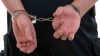 Doi poliţişti din Şoldăneşti, reţinuţi pentru trafic de influenţă. CNA i-a prins când împărţeau banii