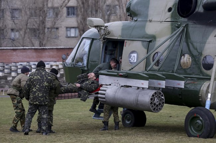 Blindate distruse, zeci de răniţi şi oraşe ruinate. FOTOREPORT din estul Ucrainei