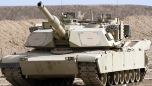 TANCURI şi alte vehicule de luptă ale SUA au ajuns la graniţa cu Rusia. SCOPUL livrării armamentului