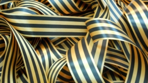 Panglicile negru-oranj ar putea fi INTERZISE în Letonia. Documentul a fost înregistrat în Parlament