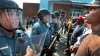 Ciocnirile dintre protestatarii de culoare şi poliţişti continuă în oraşul american Ferguson
