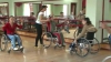 Oameni cu dizabilităţi încing dansuri. Proiect de caritate la Ungheni