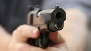 ATAC armat asupra unei familii. Un băiat de doar nouă ani a fost împuşcat chiar în faţa părinţilor