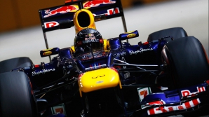 Pilotul echipei Ferrari, Sebastian Vettel, a câştigat Marele Premiu al statului Singapore