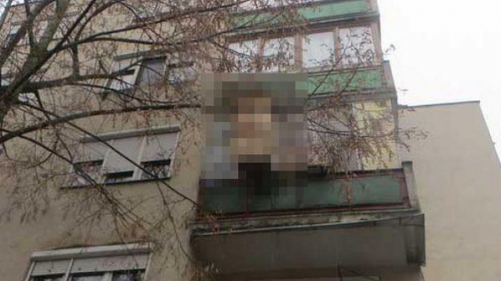 TE IA GROAZA! Ce face un român, pe balcon, pentru o economie de câţiva lei (FOTO)