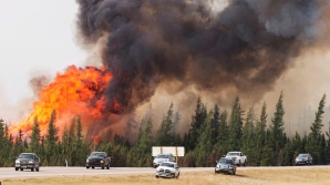 INFERNUL din Canada NU SE MAI SFÂRŞEŞTE. Flăcările ameninţă alte oraşe şi provincii