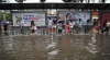 Inundații și alunecări de teren în Japonia și China. Sute de case și mașini, distruse