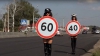 INEDIT! Polițiste topless poartă limitatoare de viteză pentru siguranța rutieră (VIDEO)