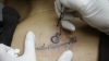 Omagiu imprimat în piele! NEBUNIA care generează cozi la saloanele de tatuaj din Thailanda