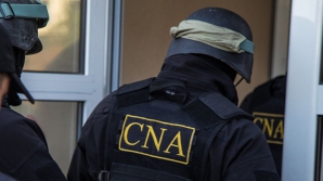 Un angajat al "Cadastru", reţinut de CNA. De ce este bănuit funcţionarul