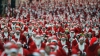 Madridul s-a deghizat în roșu! Sute de Moși Crăciuni au alergat în scop caritabil (VIDEO)