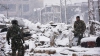 O furtună de zăpadă îngreunează operațiunile de evacuare din Alep