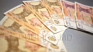 Creditele oferite în lei moldoveneşti continuă să se ieftinească. Ce spun experţii economici