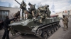 SPERANŢE DE PACE în Ucraina. Rebelii îşi retrag arnamentul din zona de conflict