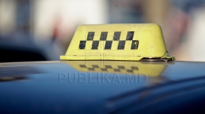 Companii de taxi, percheziţionate de PCCOCS. Trei administratori au fost reţinuţi
